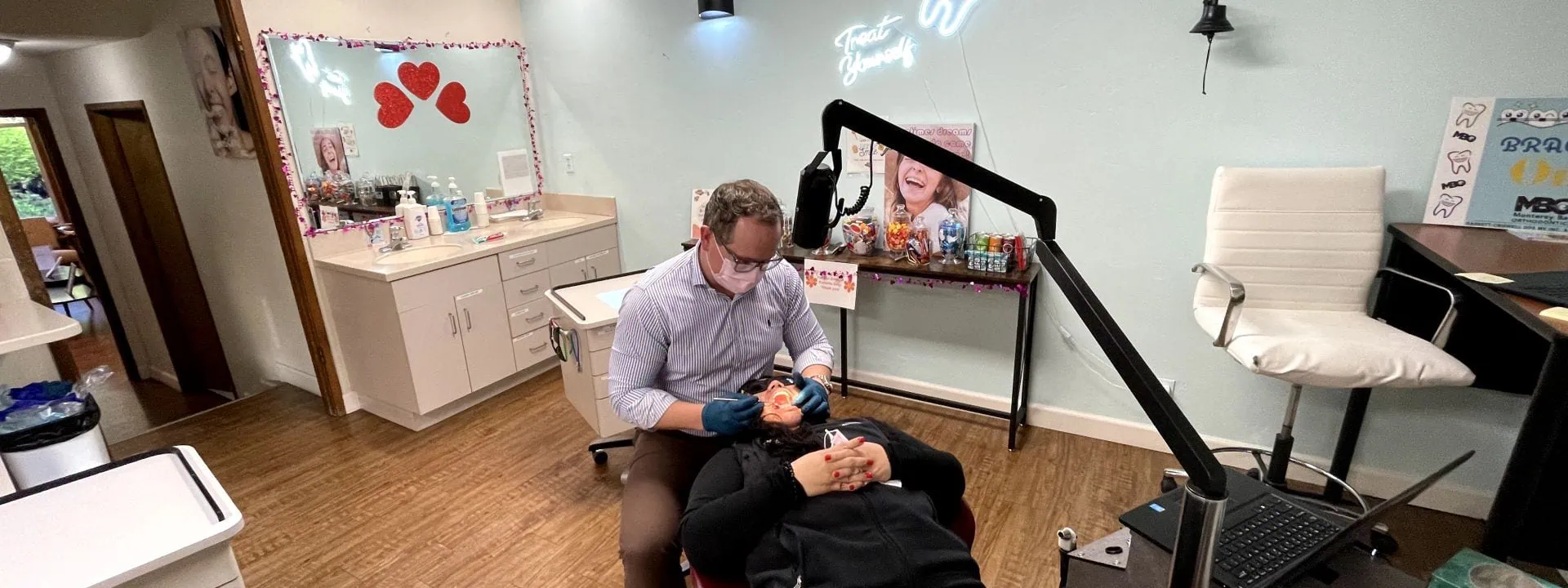Dr. Garrett examining patient's teeth