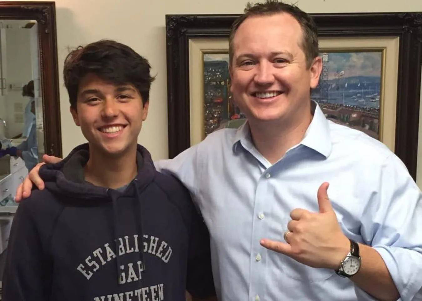 Monterey Bay Orthodontics clear aligners provider and patient smiling with beautiful results.