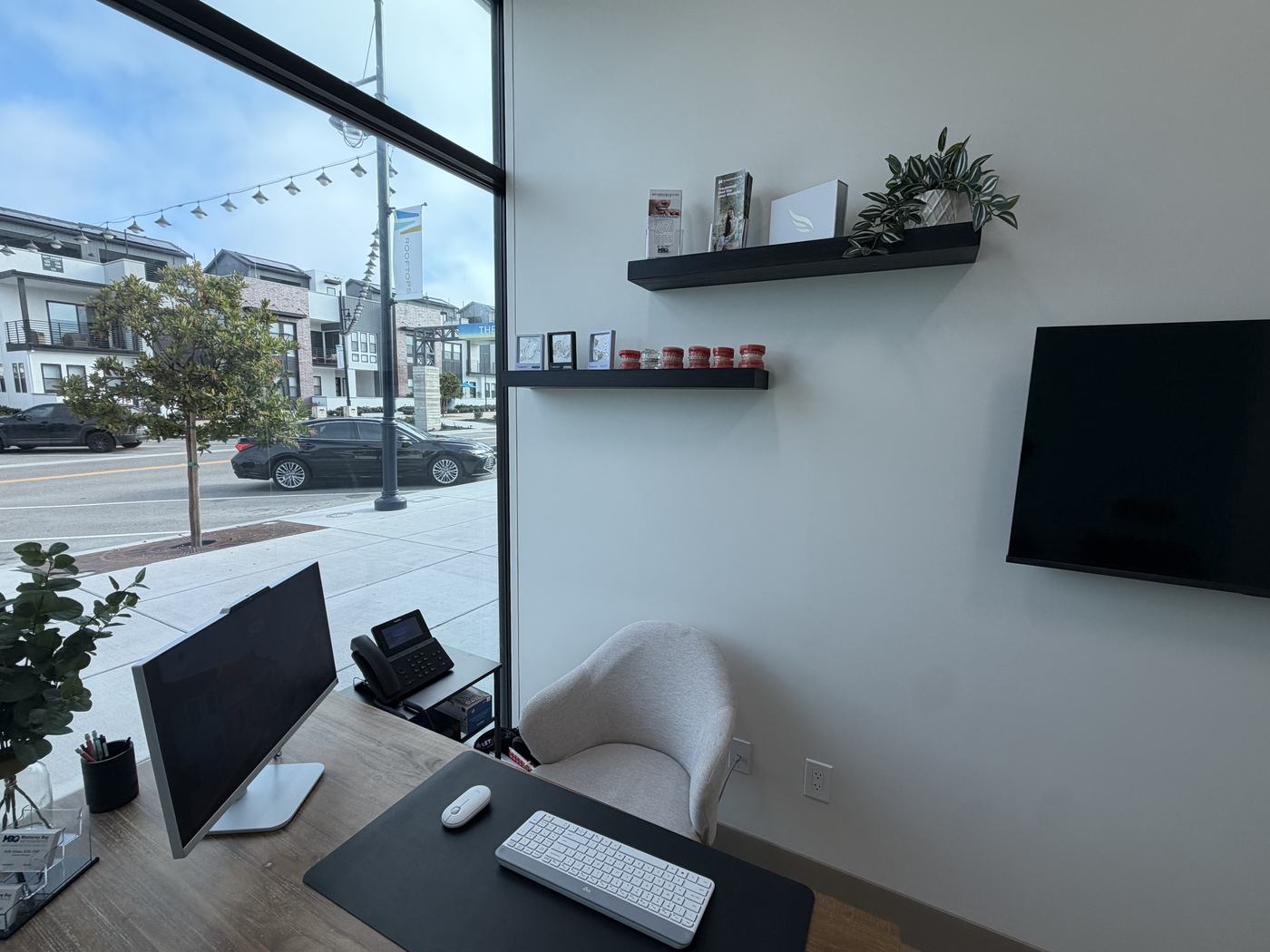 Consultation desk with braces models at the Marina, CA office